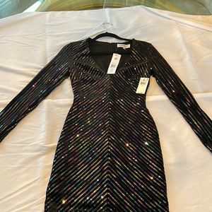 Small Cosmopolitan black dress with multi color sequin